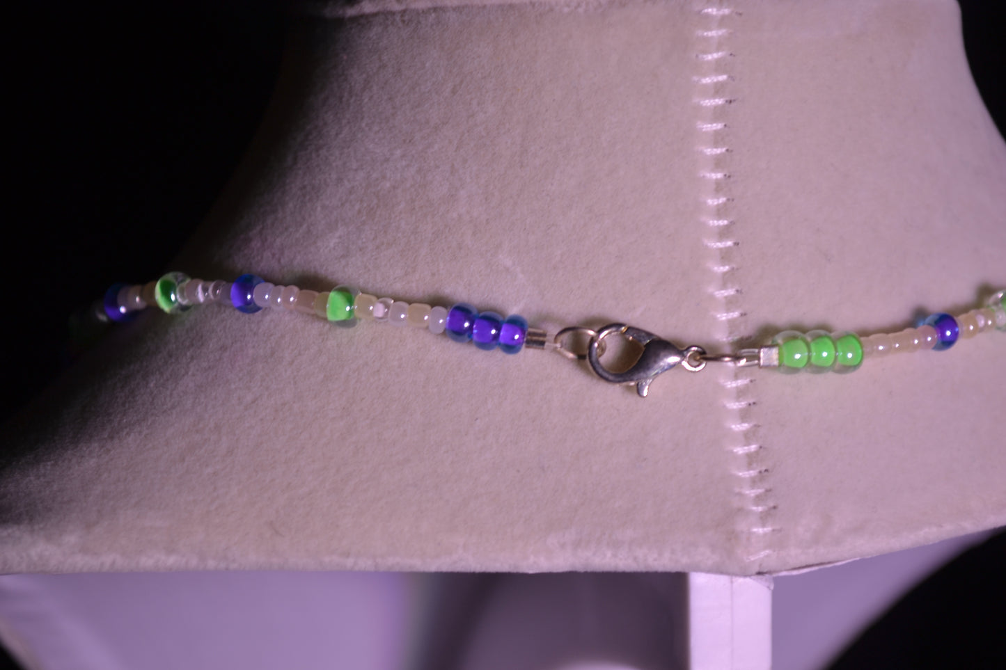 Purple and green glass bead necklace