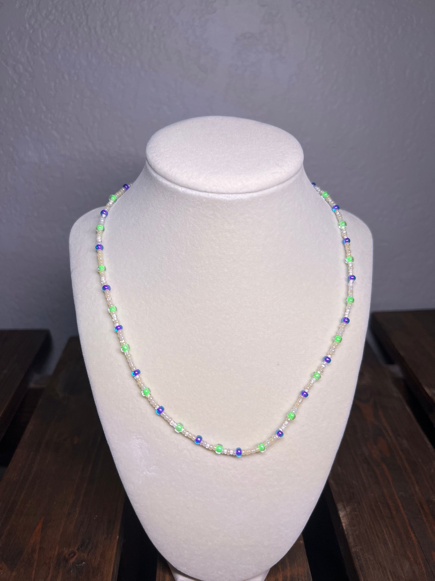 Purple and green glass bead necklace