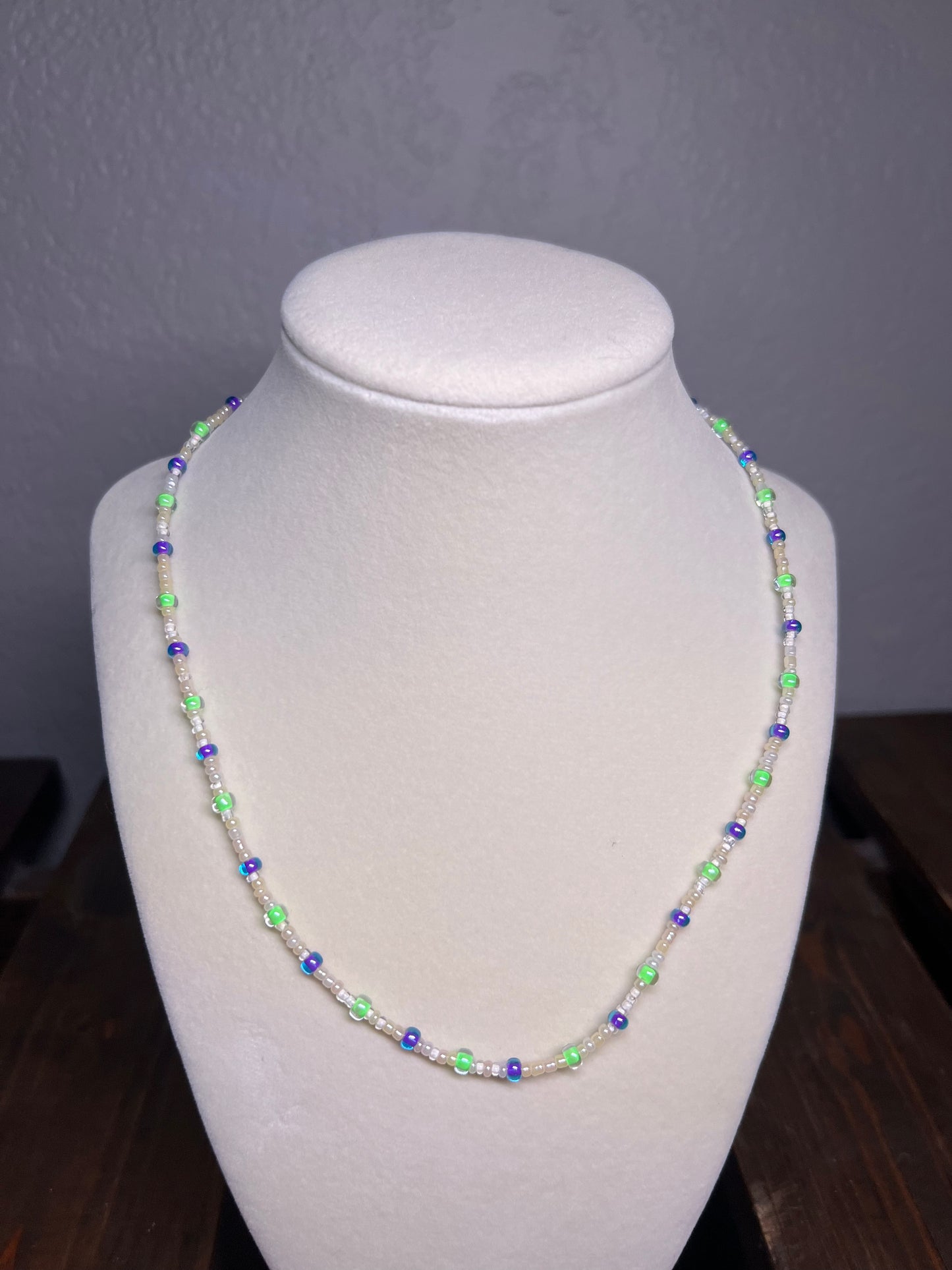 Purple and green glass bead necklace