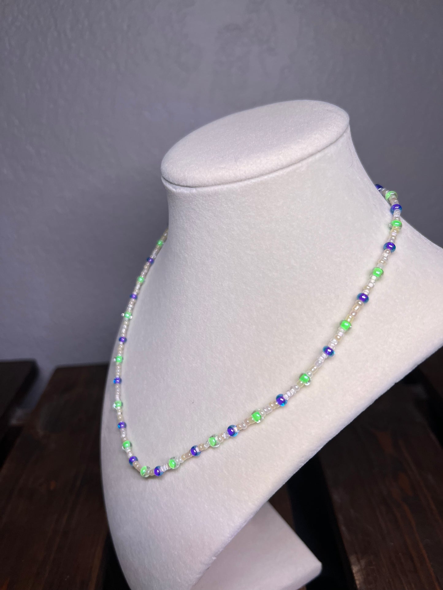 Purple and green glass bead necklace