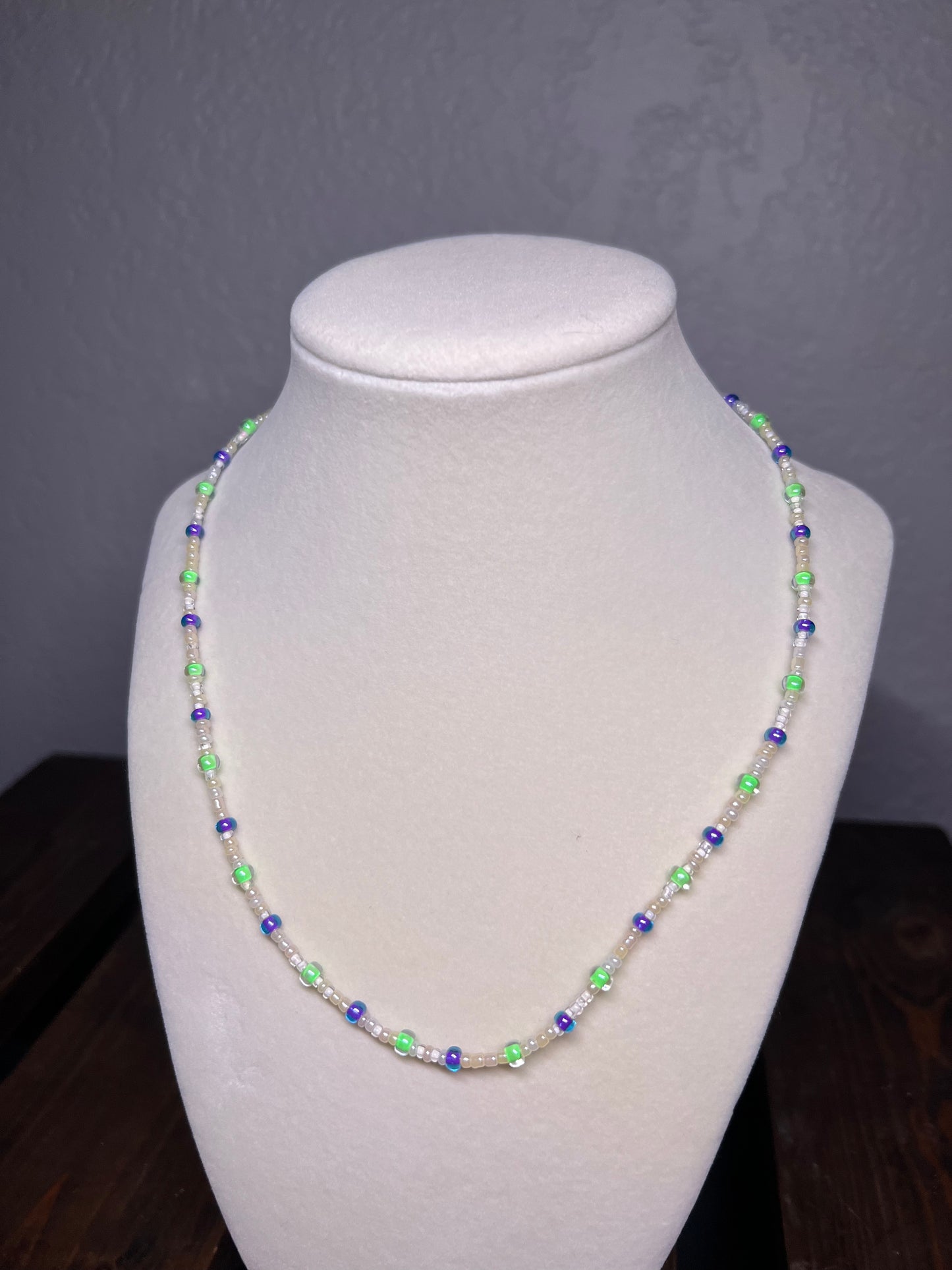 Purple and green glass bead necklace