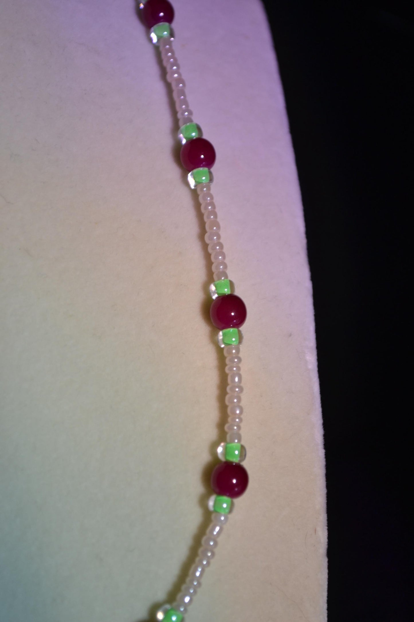 Cranberry and green glass bead necklace