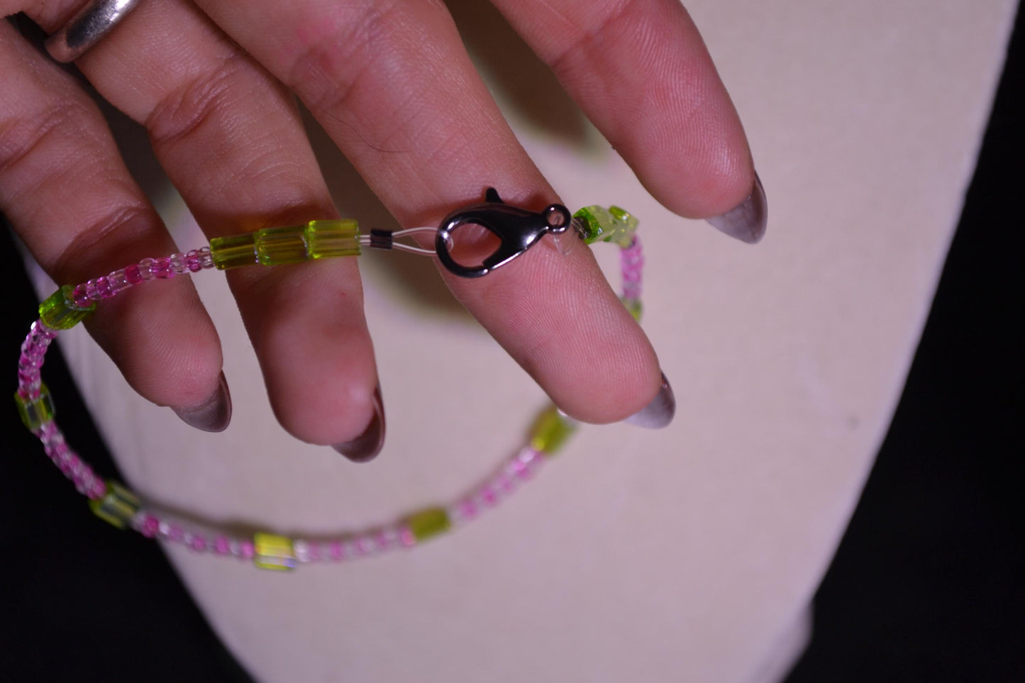 Beaded bracelet. Pink and green