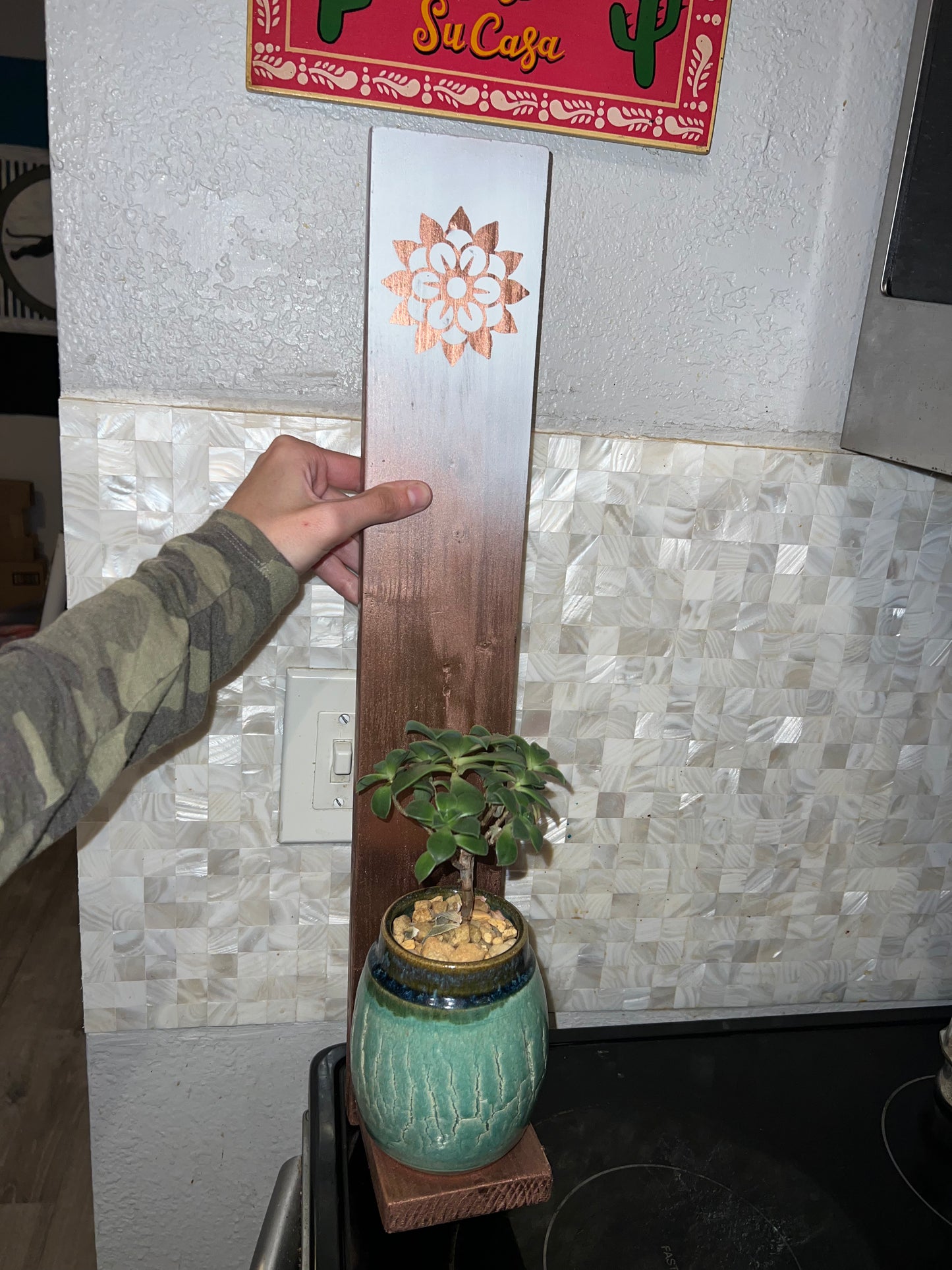 Copper and white wooden plant shelf