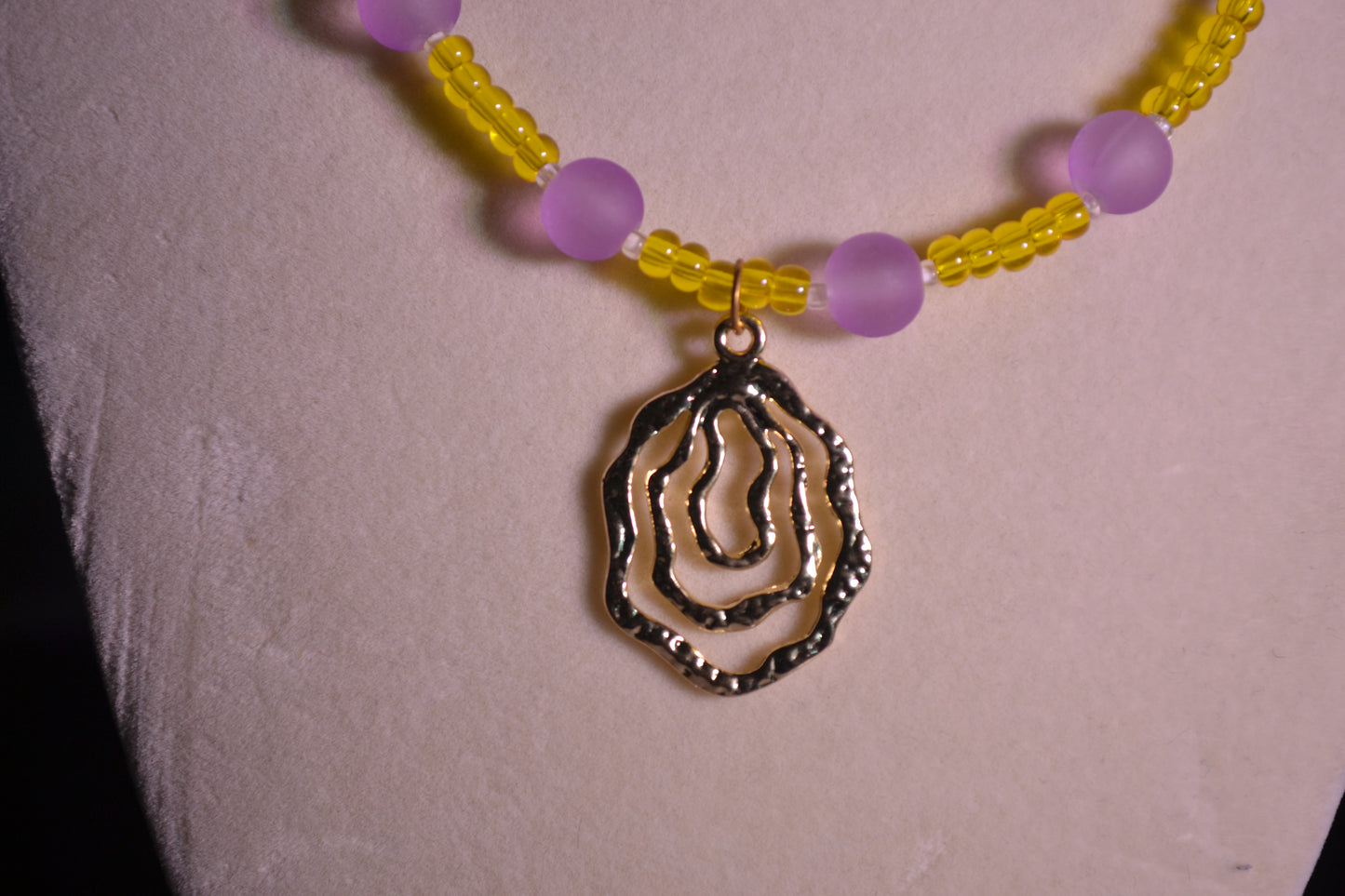 Yellow and purple beaded necklace