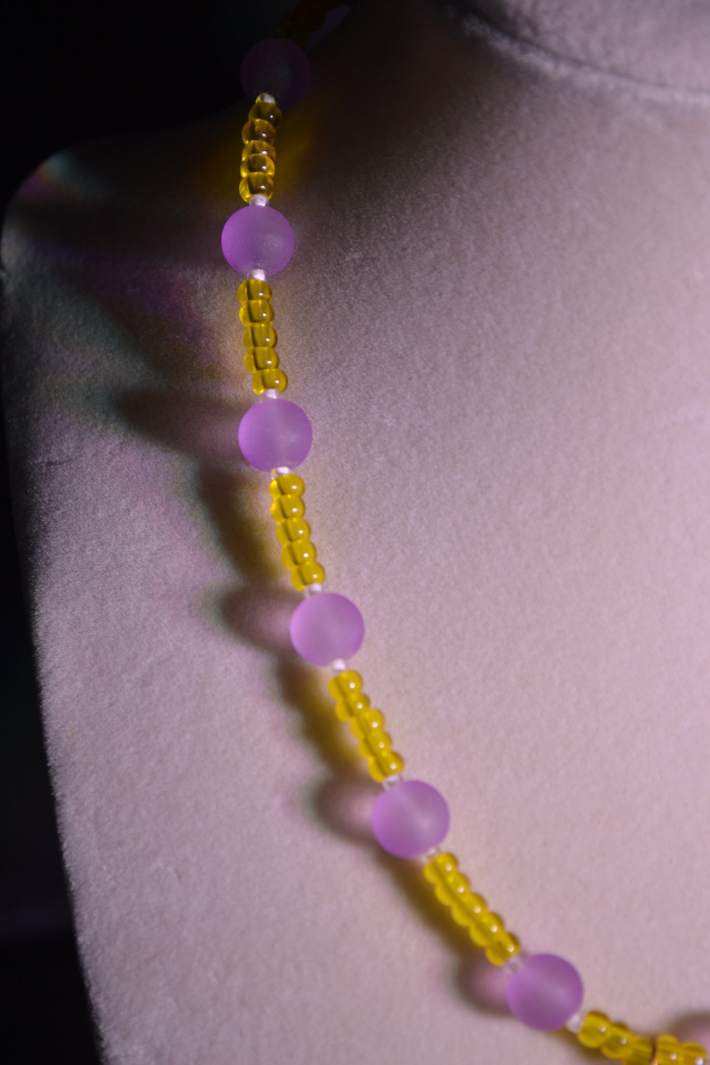 Yellow and purple beaded necklace