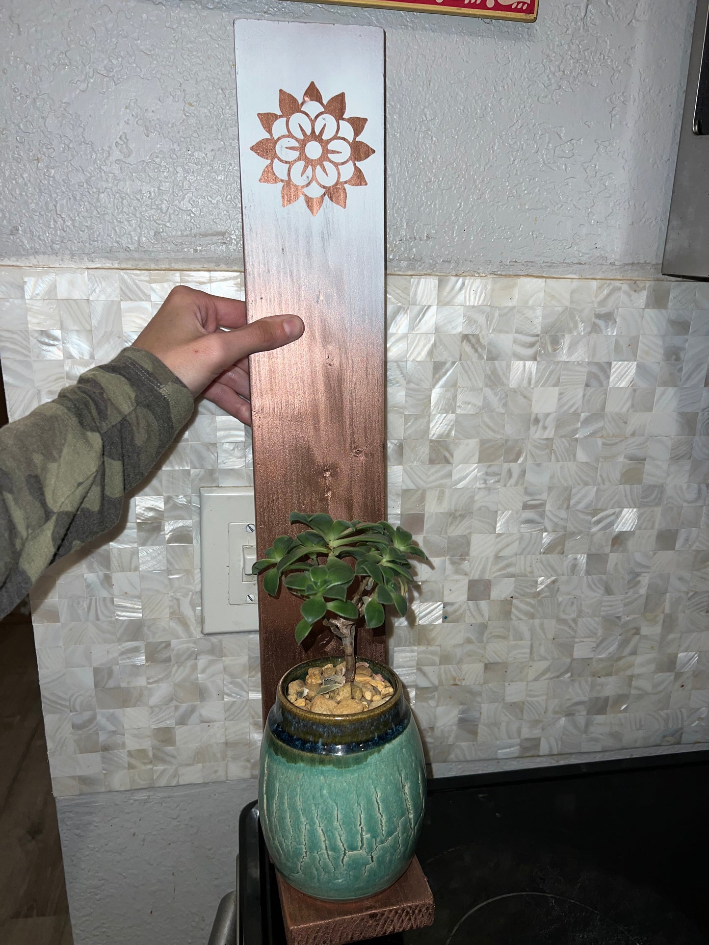 Copper and white wooden plant shelf