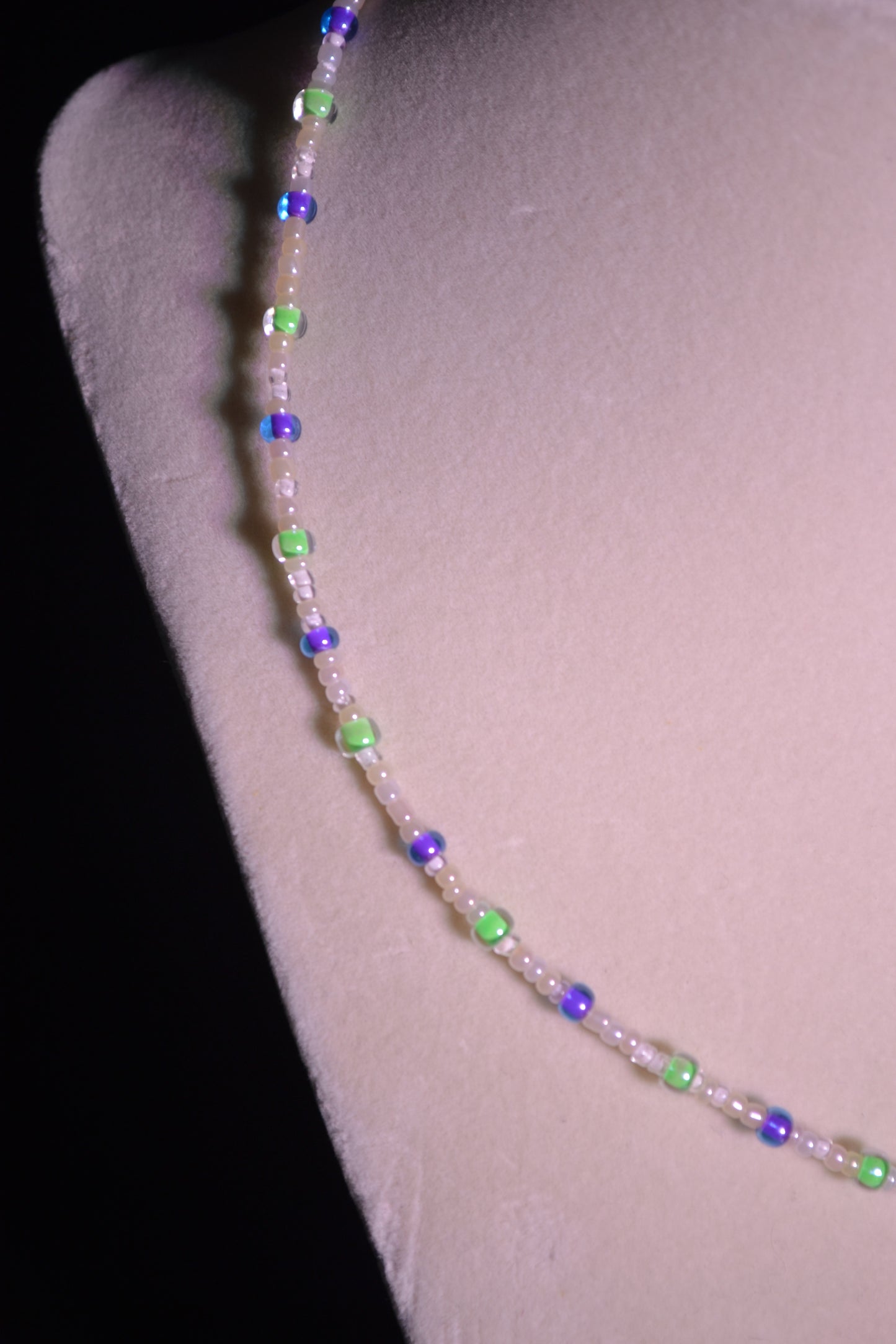 Purple and green glass bead necklace