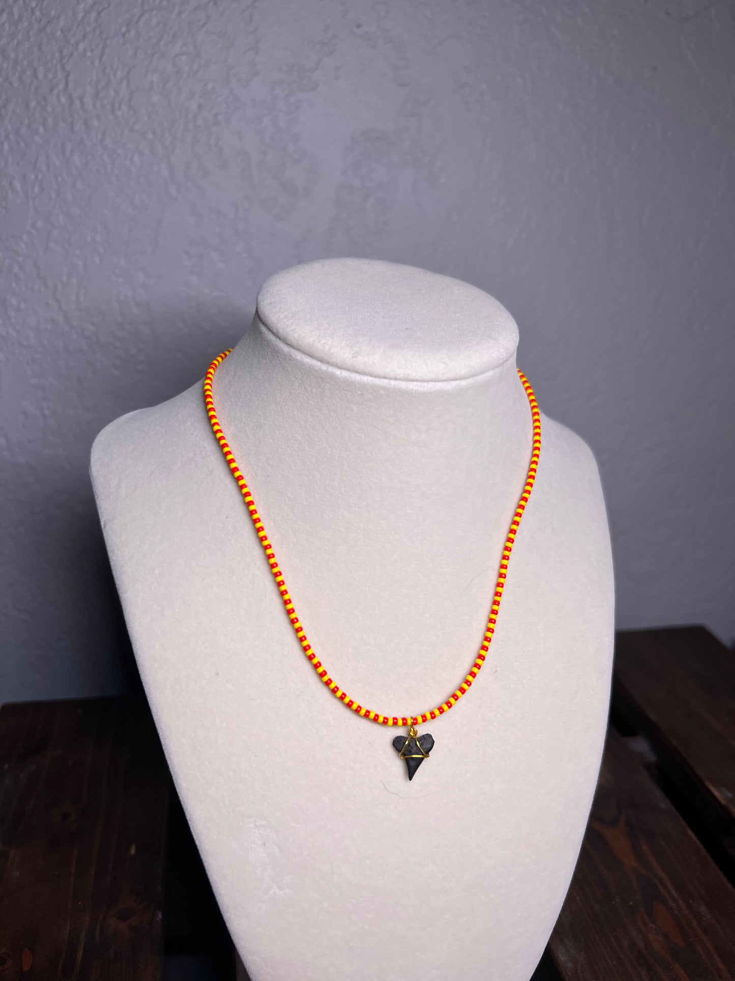 Yellow & red beaded necklace with wire wrapped sharks tooth