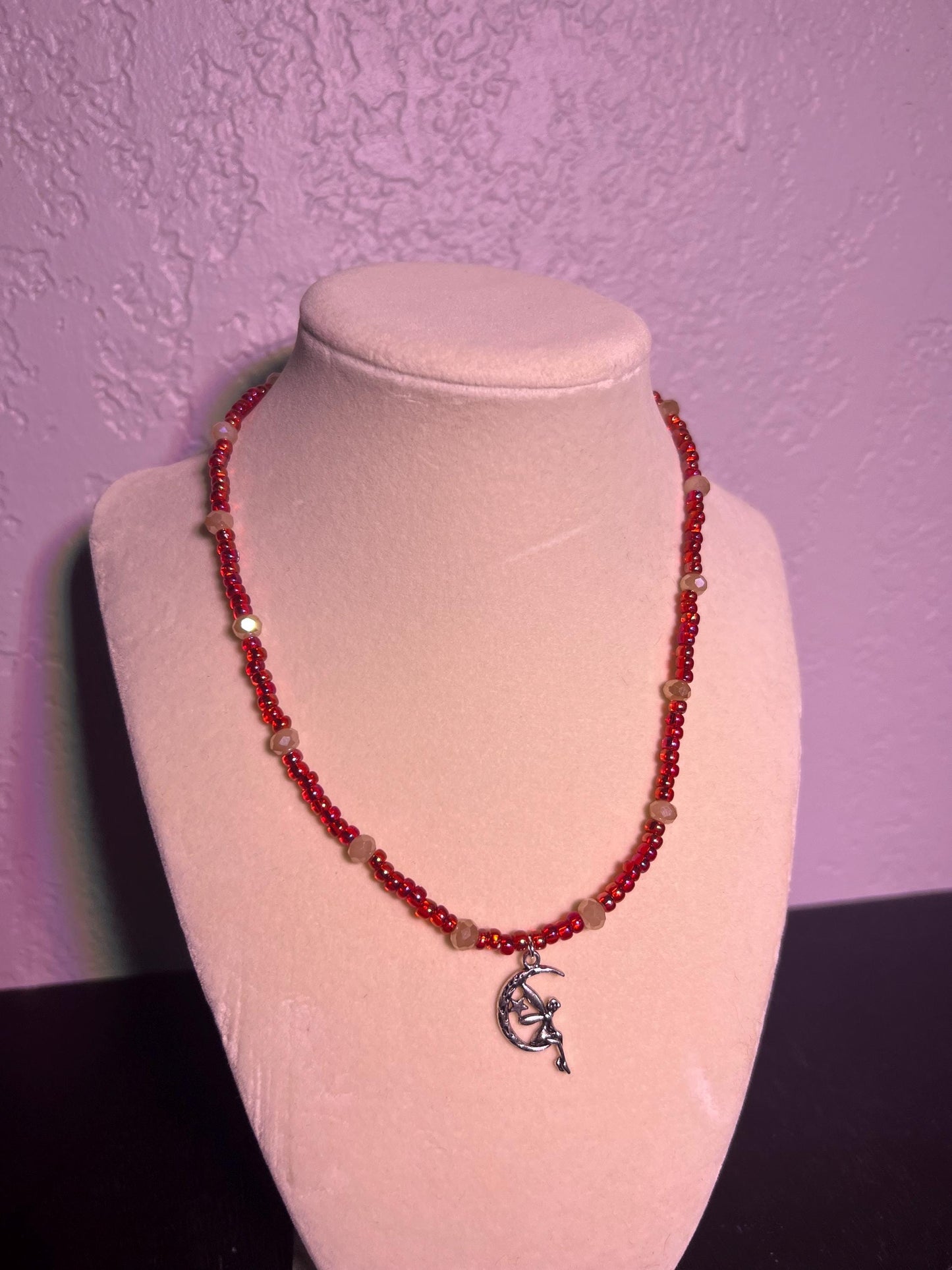Glass bead necklace. Fairy pendant. Red and peachy pearl