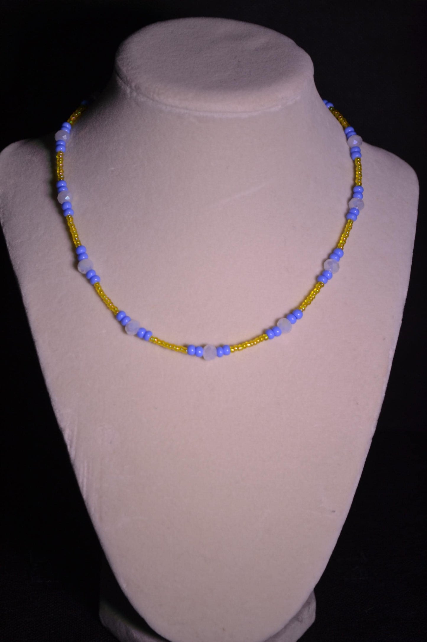 Multicolor glass bead necklace. Blue, yellow, and white.