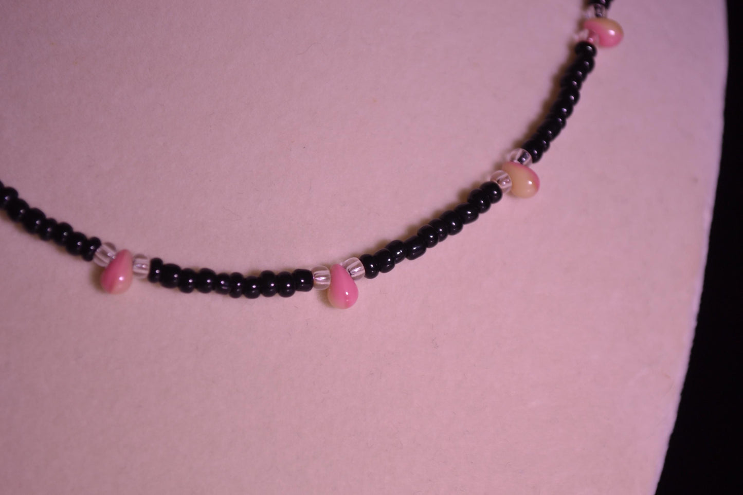 Multicolor glass bead necklace. Black, pink, and yellow