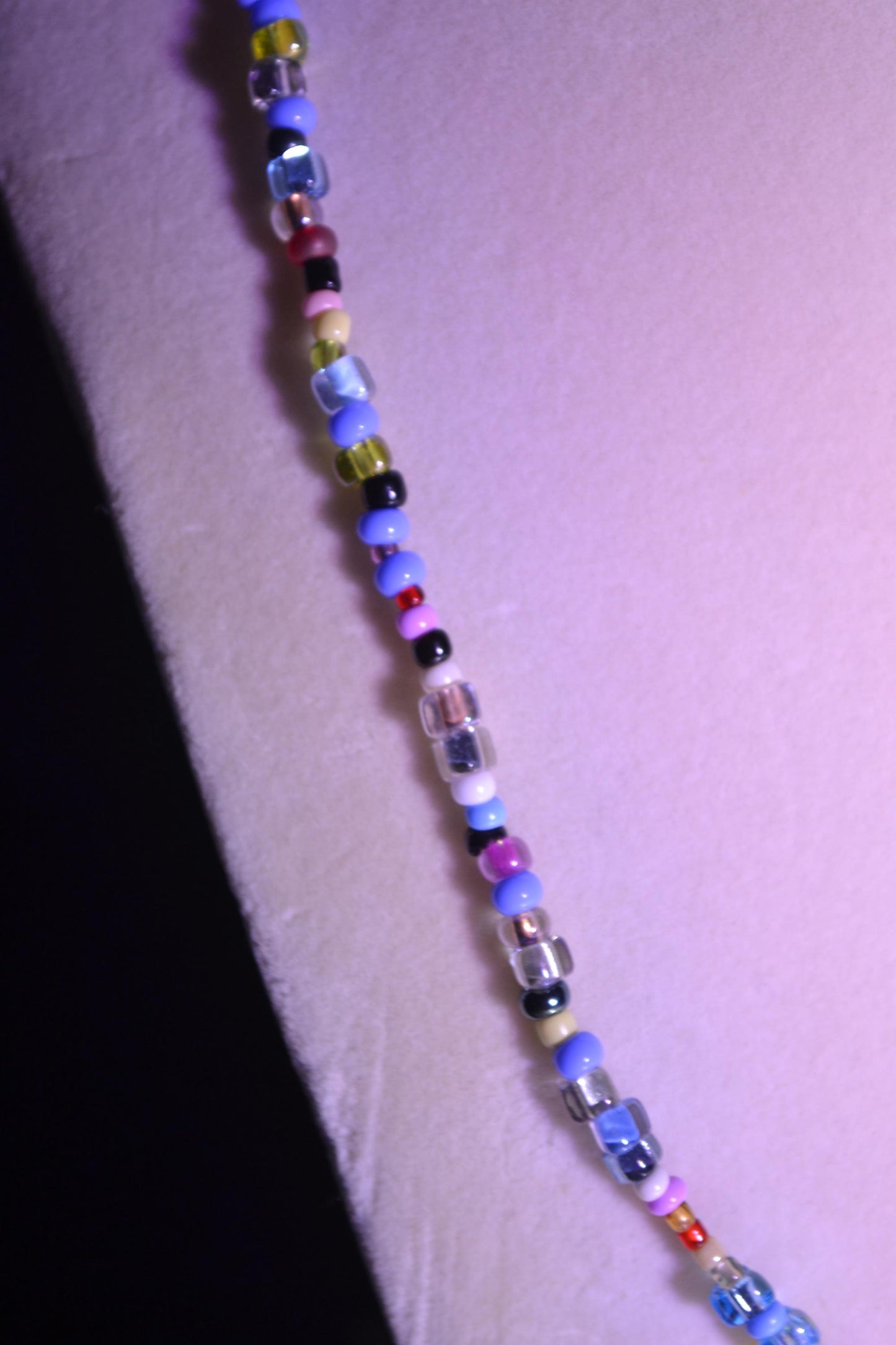 Multicolor glass bead necklace. Seahorse pendant