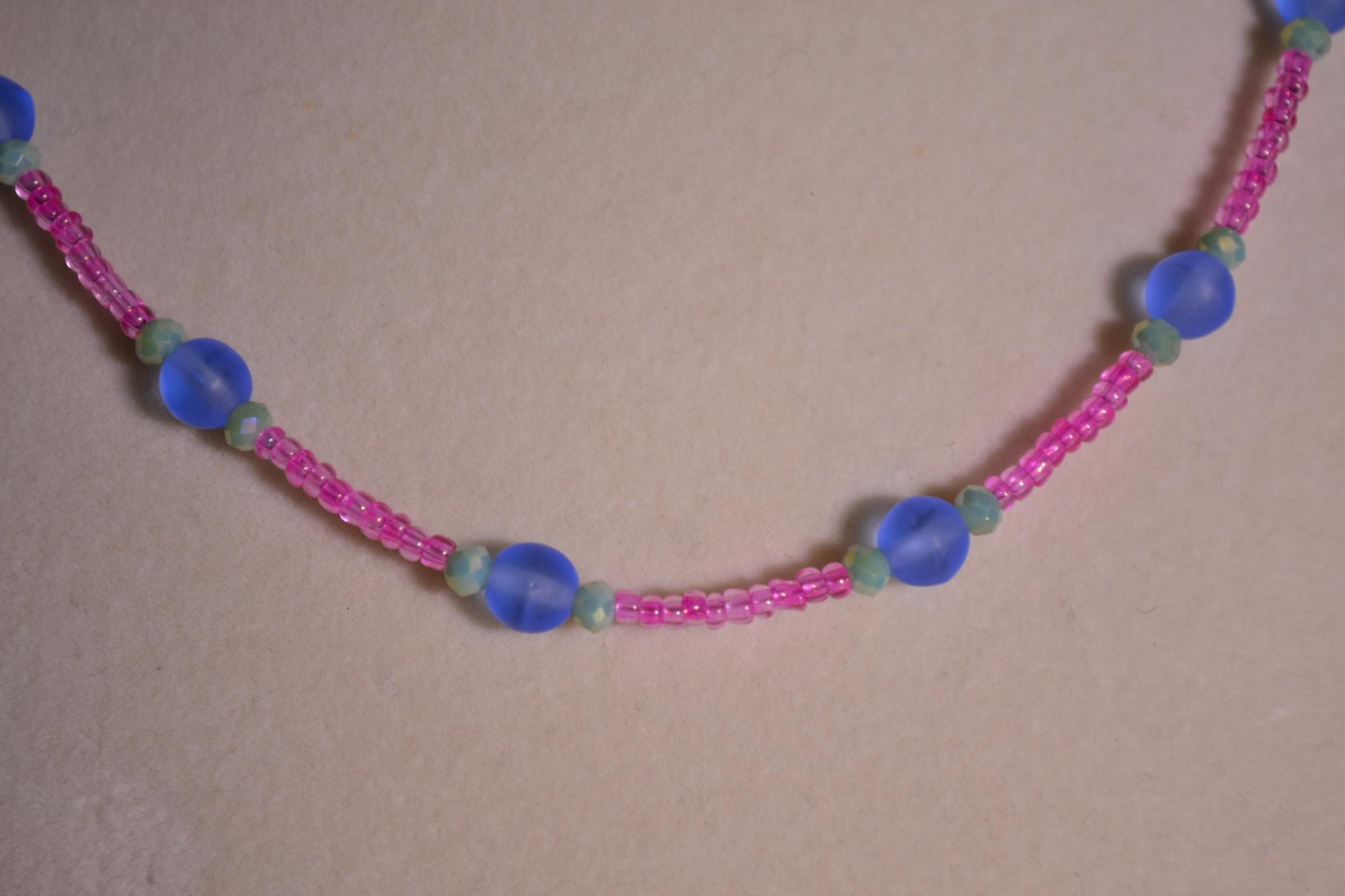 Pink, blue, and green glass bead necklace