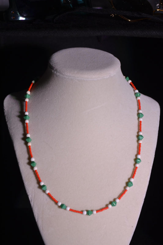 Glass bead necklace. Red, white and green