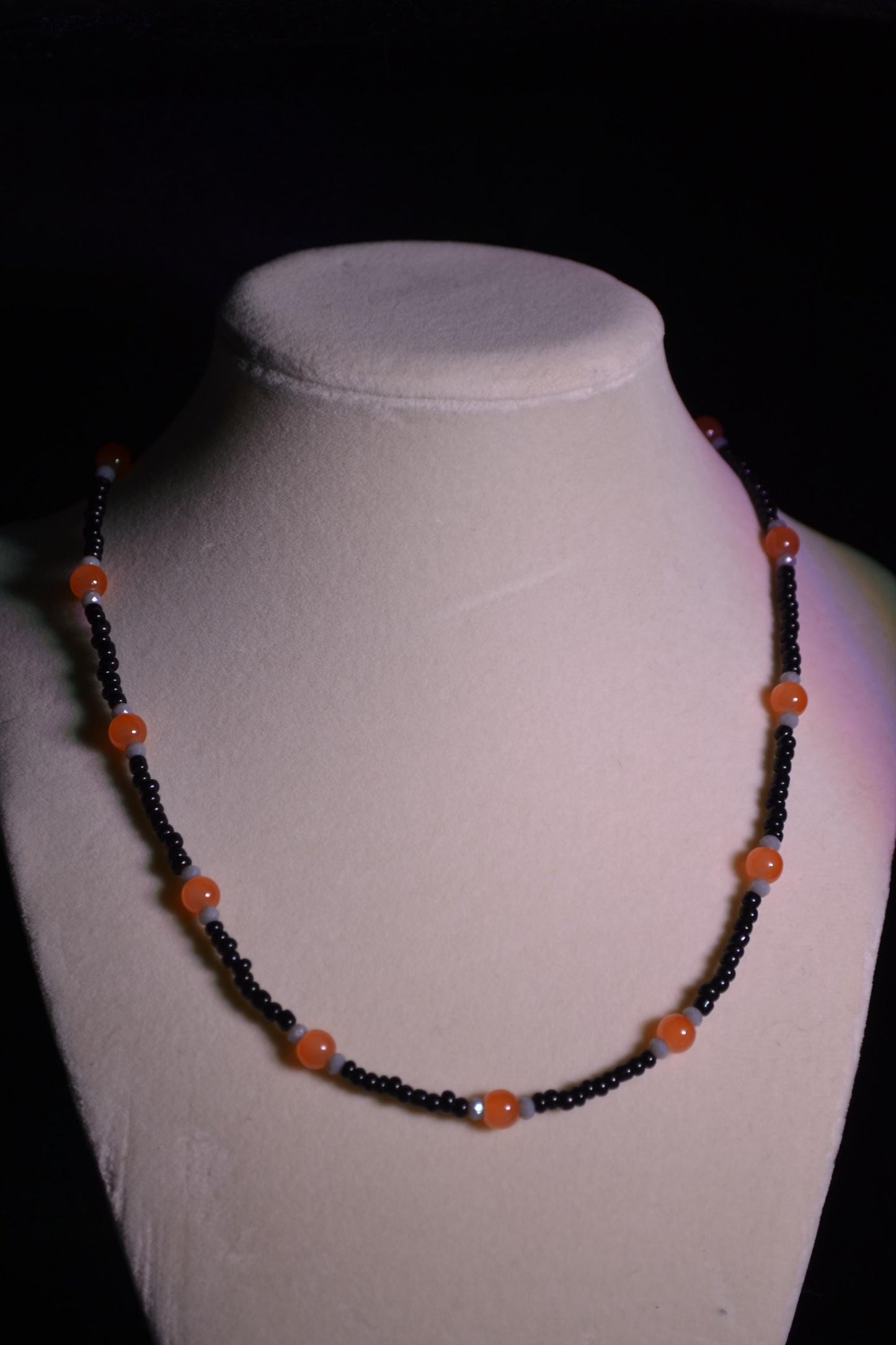 Orange, black, and gray glass bead necklace