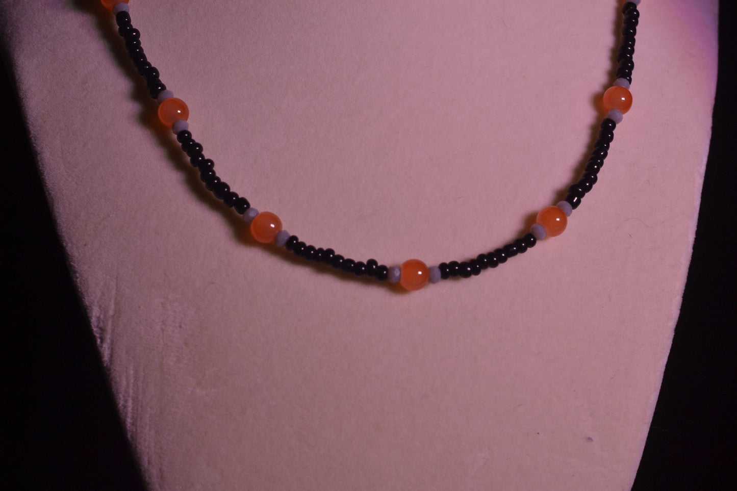 Orange, black, and gray glass bead necklace
