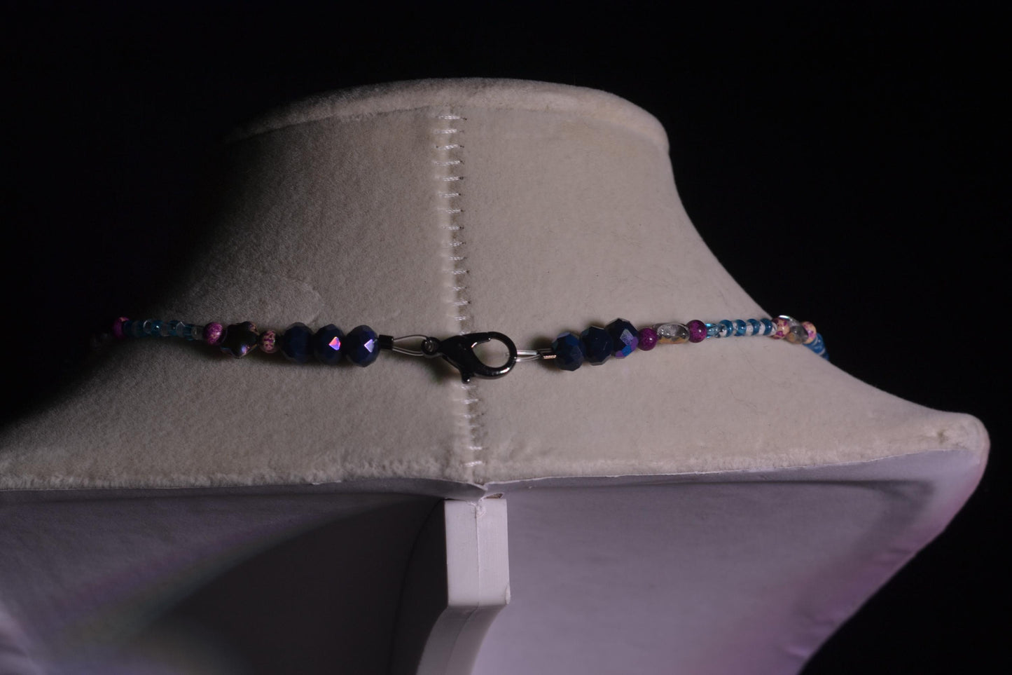 Multicolor glass bead necklace. Purple stars, blue, and white