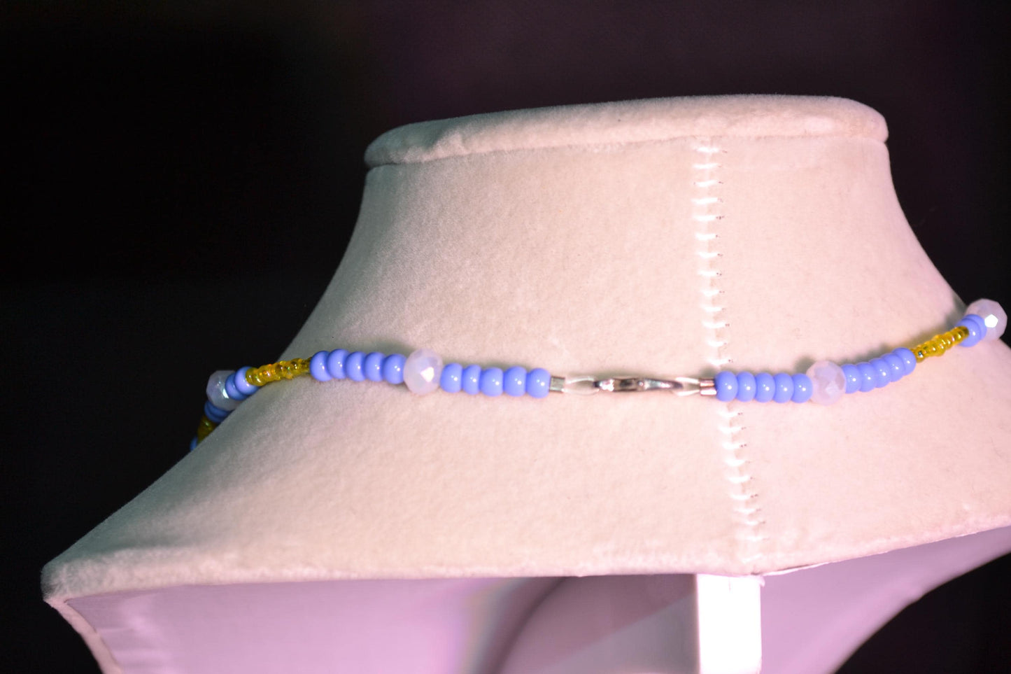 Multicolor glass bead necklace. Blue, yellow, and white.