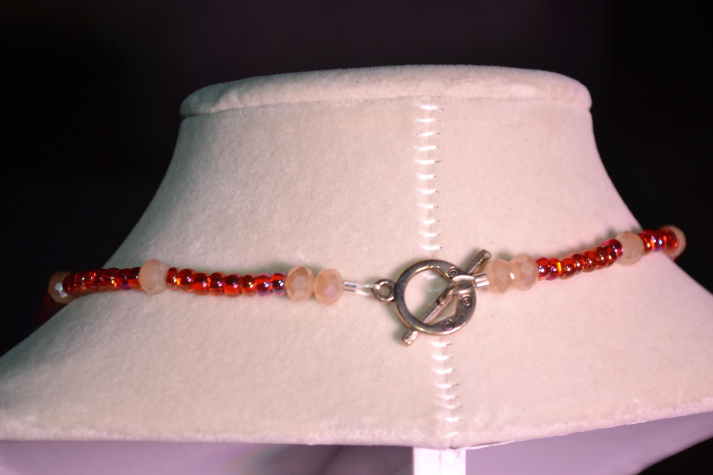 Glass bead necklace. Fairy pendant. Red and peachy pearl