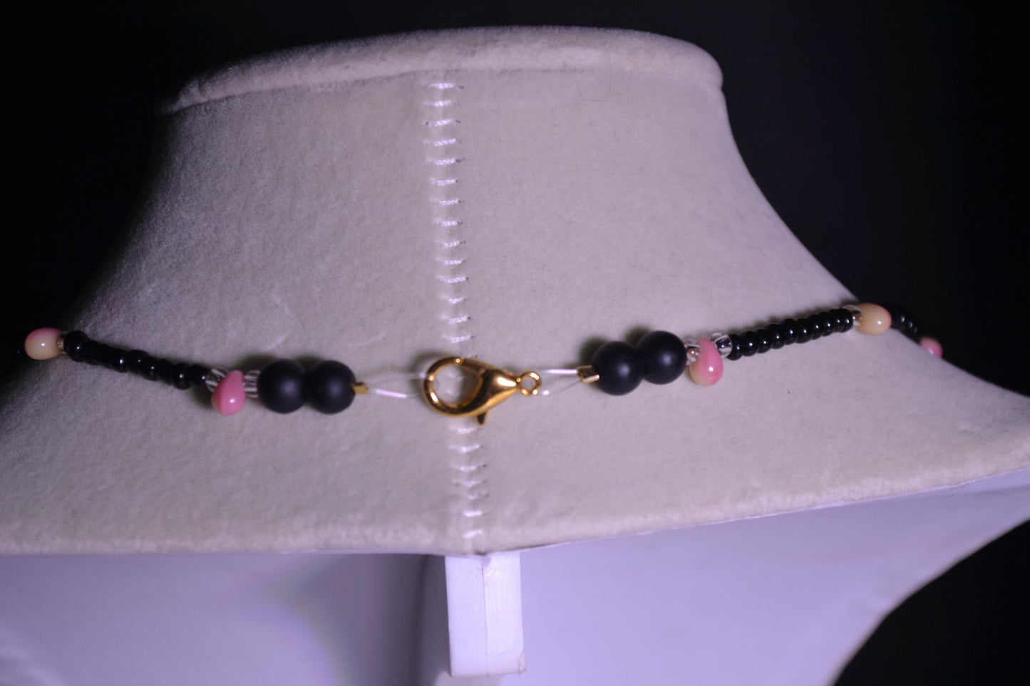 Multicolor glass bead necklace. Black, pink, and yellow