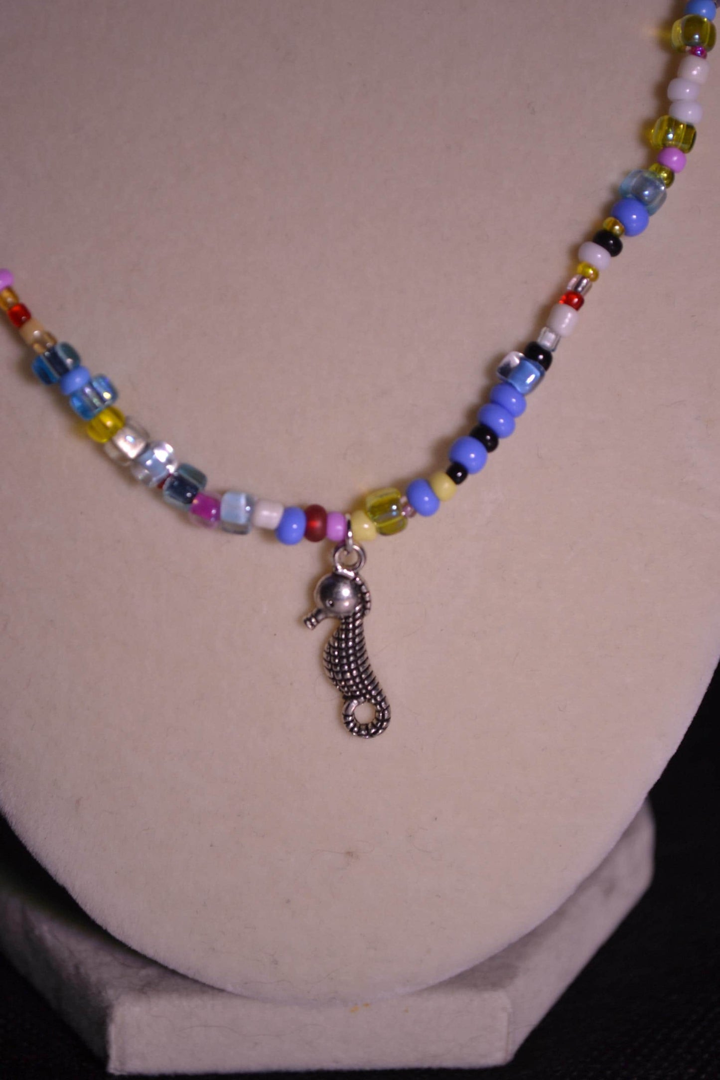 Multicolor glass bead necklace. Seahorse pendant