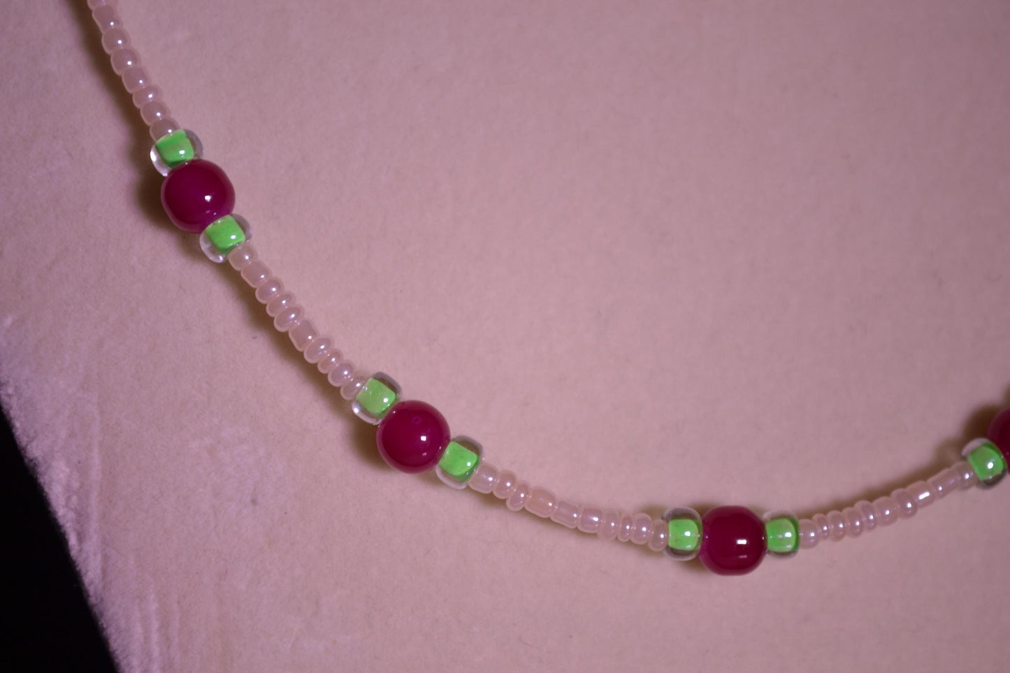 Cranberry and green glass bead necklace