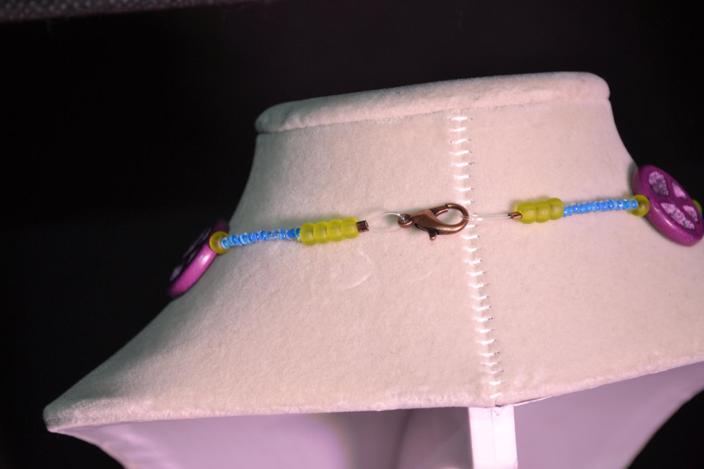 Multicolor glass bead necklace. Peace sign, blue, and green