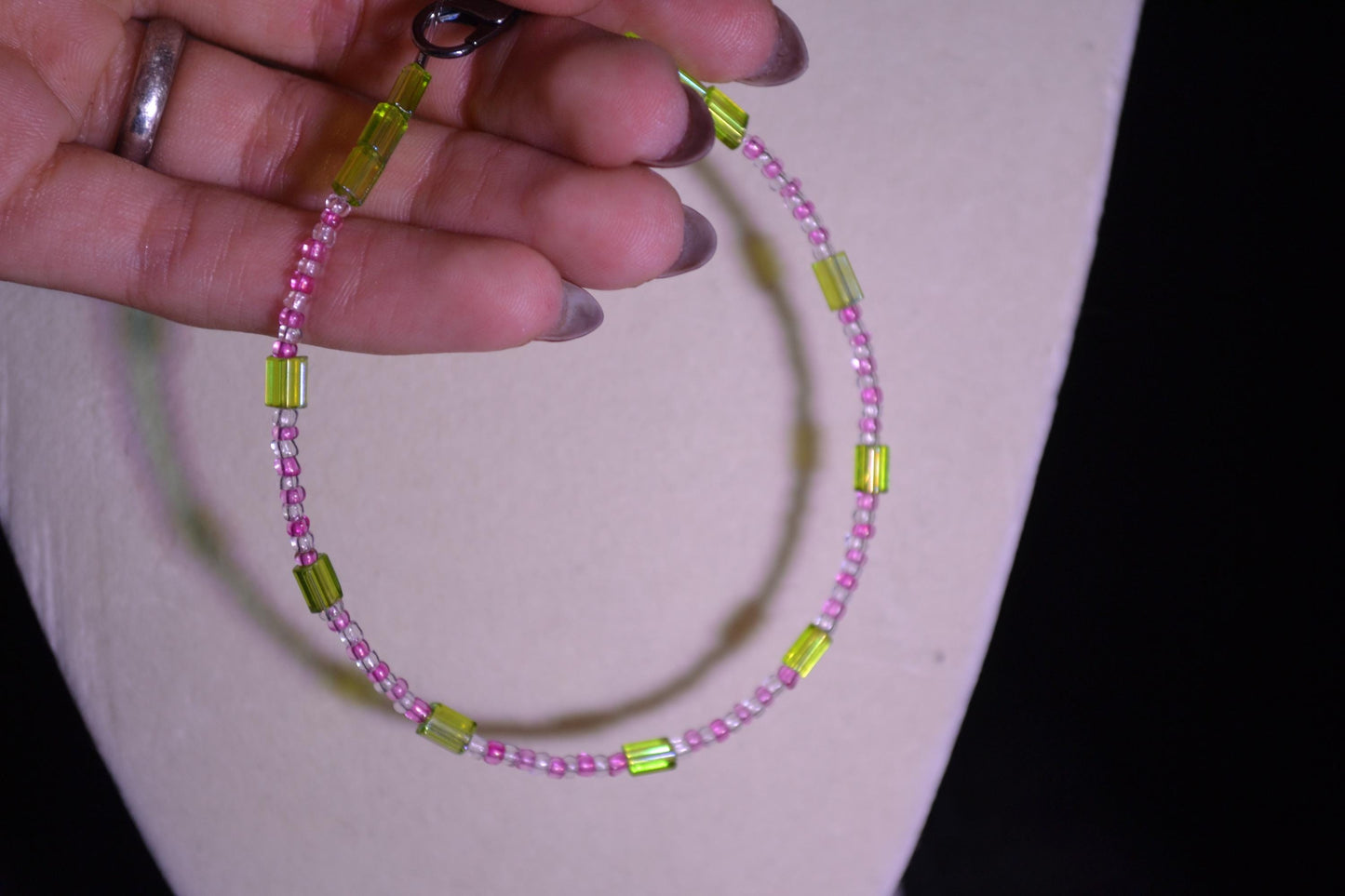 Beaded bracelet. Pink and green